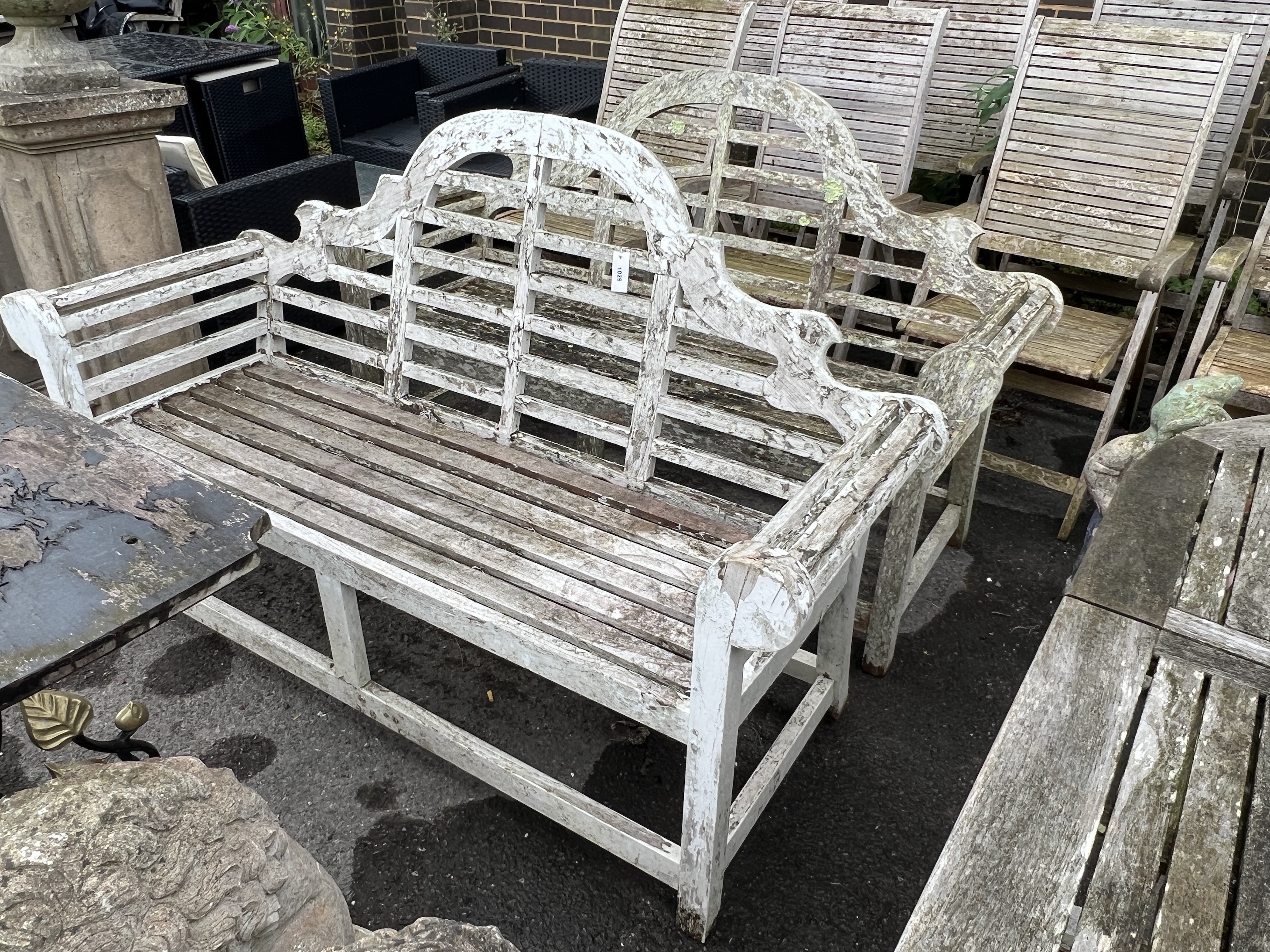 A pair of Lutyens style weathered teak garden benches, length 170cm, depth 56cm, height 103cm